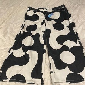 NWT wide leg jeans with flower pattern.